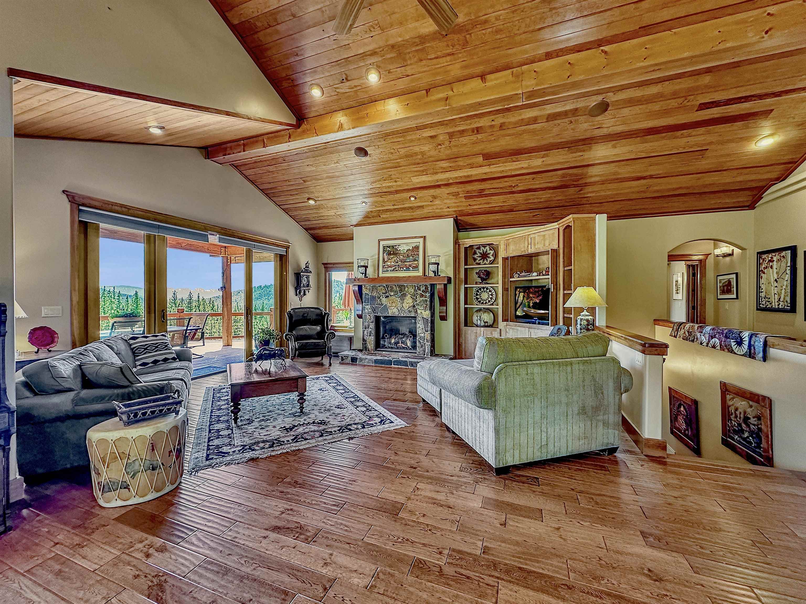 1947 Grizzly Ranch Road Portola, CA 96122 - Photo 5 of 25 a living room with furniture and a wooden floor