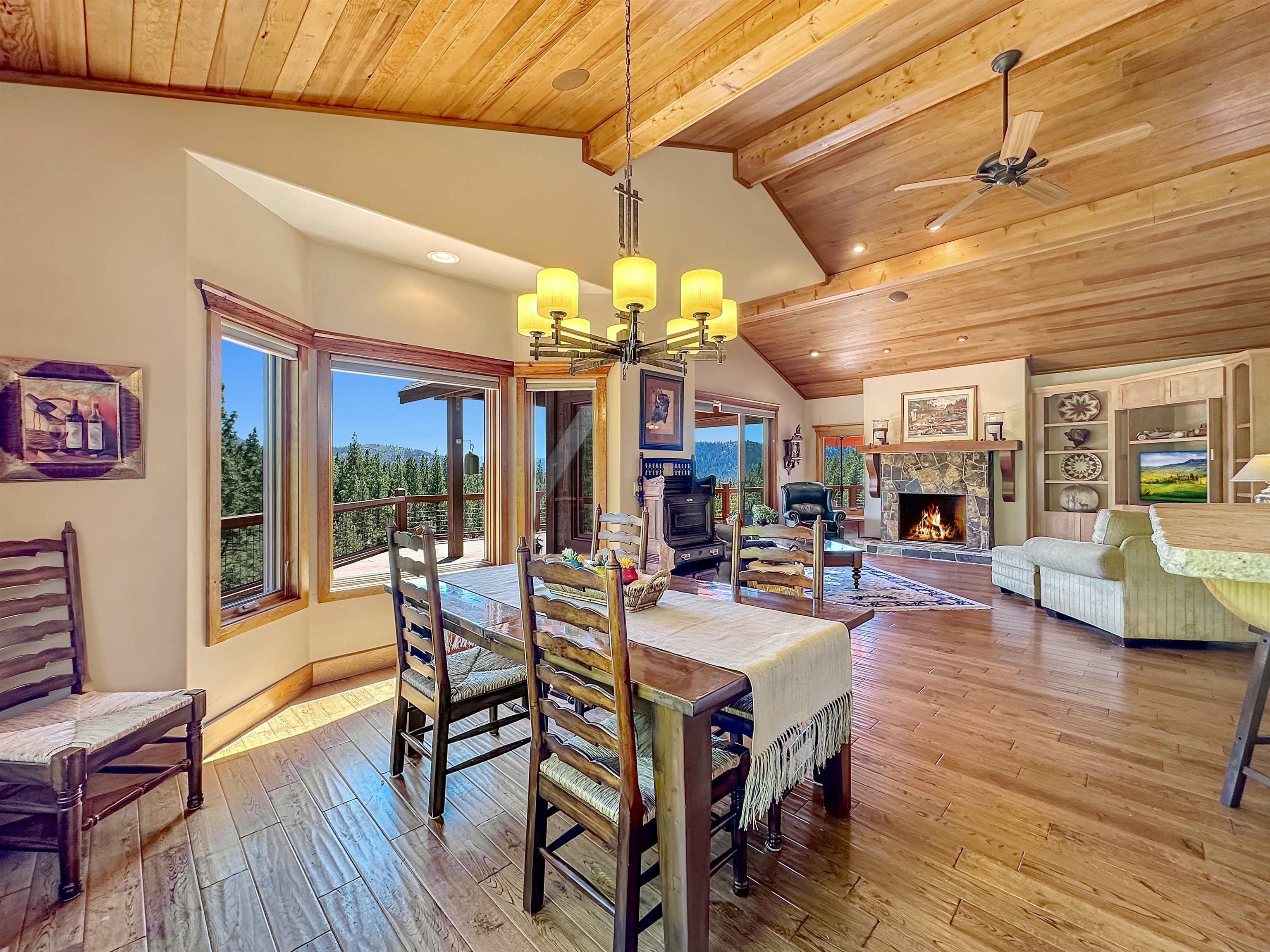 1947 Grizzly Ranch Road Portola, CA 96122 - Photo 7 of 25 a view of a dining room with furniture wooden floor and chandelier