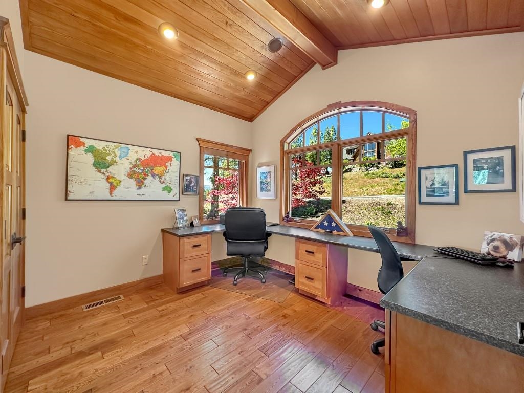 1947 Grizzly Ranch Road Portola, CA 96122 - Photo 9 of 25 a room with furniture and a flat screen tv