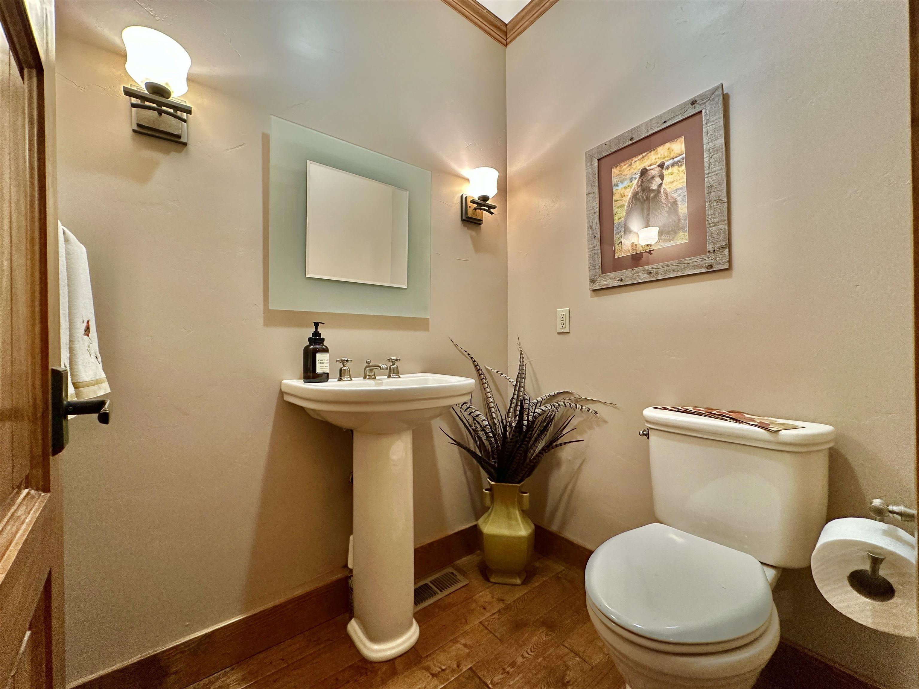 1947 Grizzly Ranch Road Portola, CA 96122 - Photo 10 of 25 a bathroom with a toilet sink and mirror