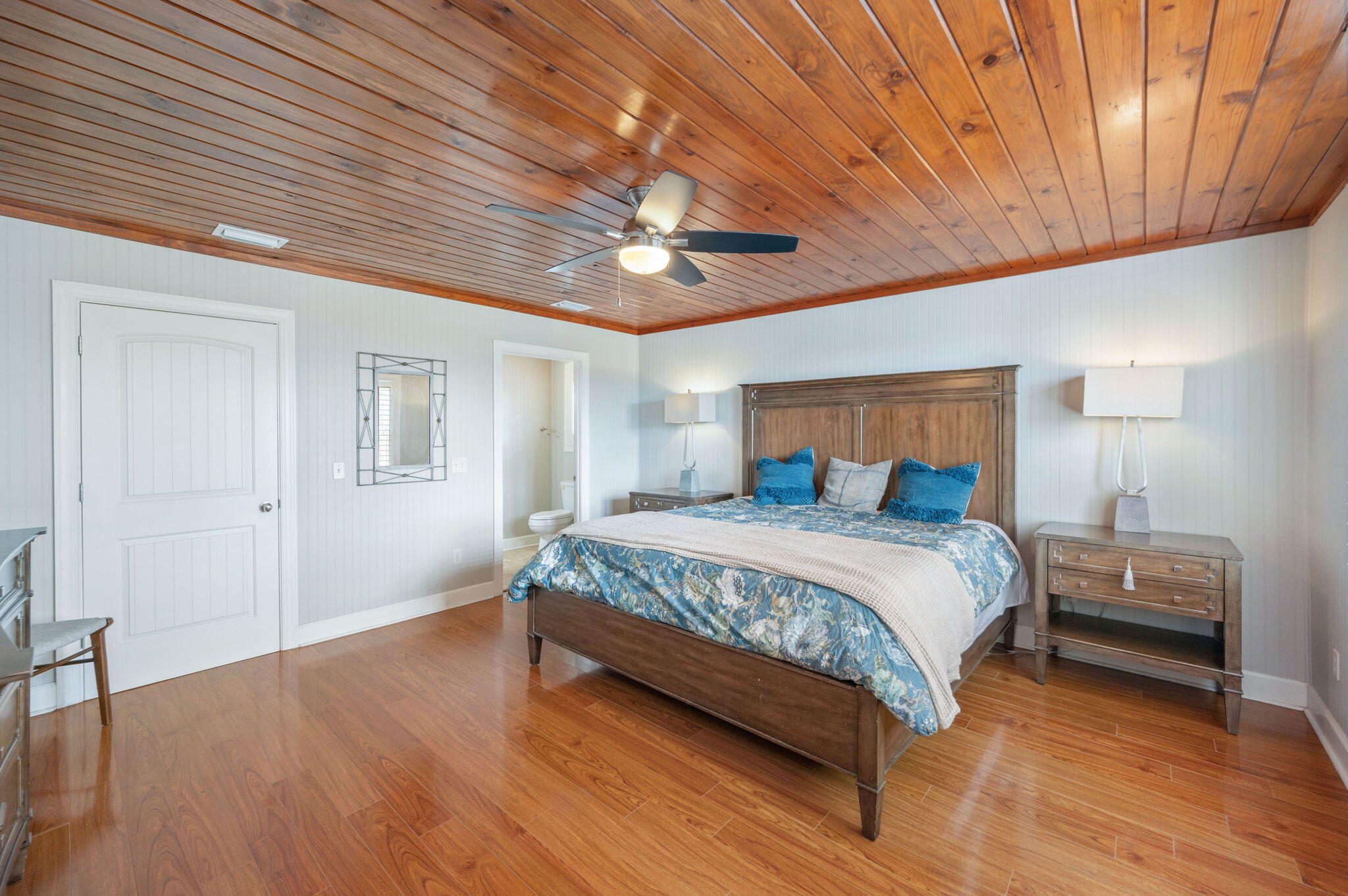 126 Tall Oaks Road DeFuniak Springs, FL 32435 - Photo 16 of 50 a bedroom with a bed and a chandelier