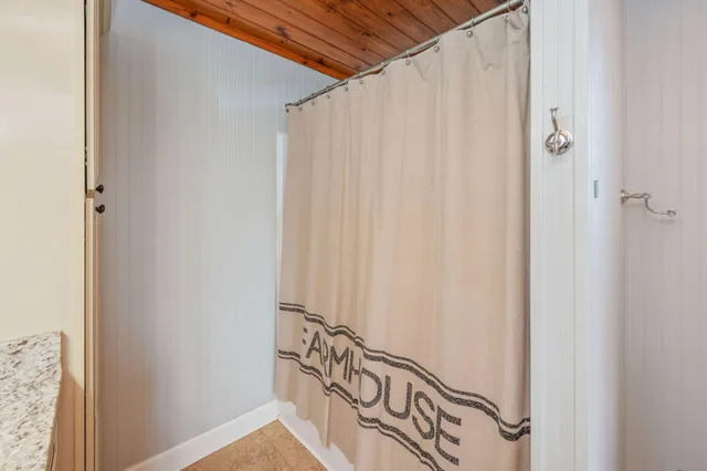 a bathroom with a sink toilet and vanity