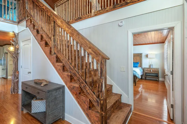 a view of entryway with wooden floor