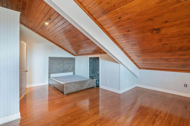 a view of livingroom with furniture and wooden floor