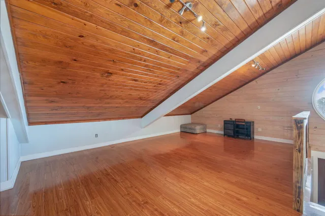 a bathroom with a sink vanity and a mirror