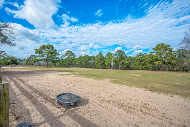 a view of a road with a yard