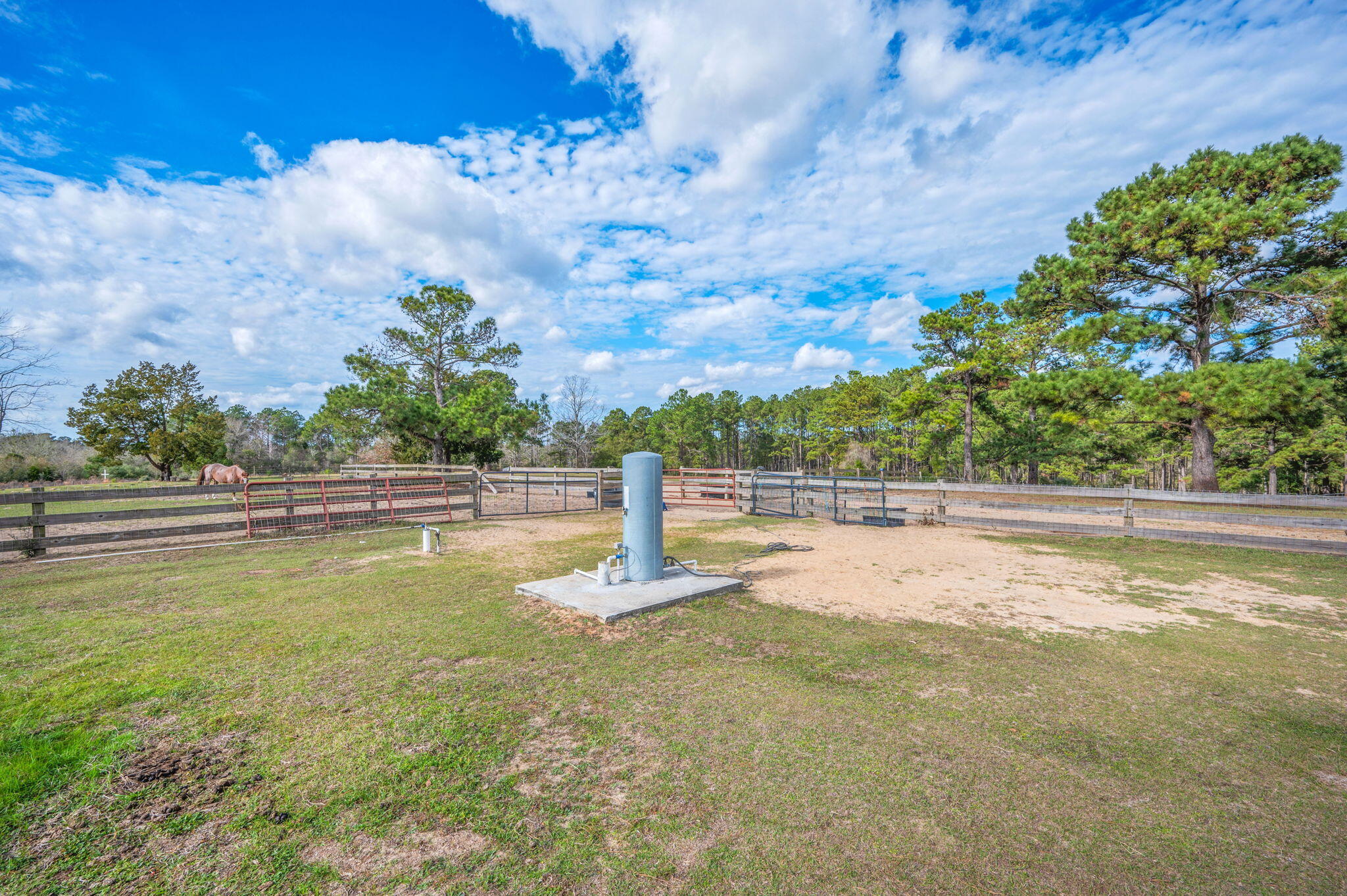 126 Tall Oaks Road DeFuniak Springs, FL 32435 - Photo 42 of 50 a view of a swimming pool with an outdoor space and seating area