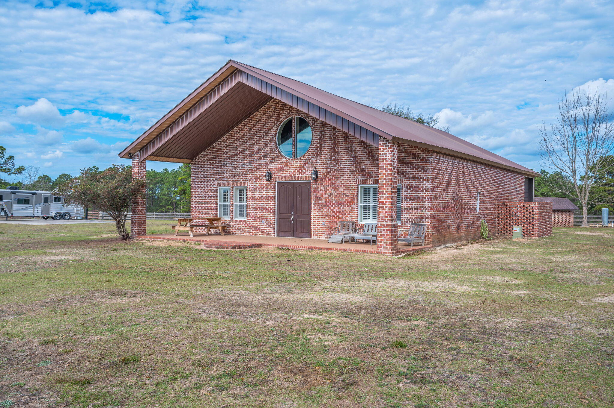126 Tall Oaks Road DeFuniak Springs, FL 32435 - Photo 5 of 50 a view of a house with a yard