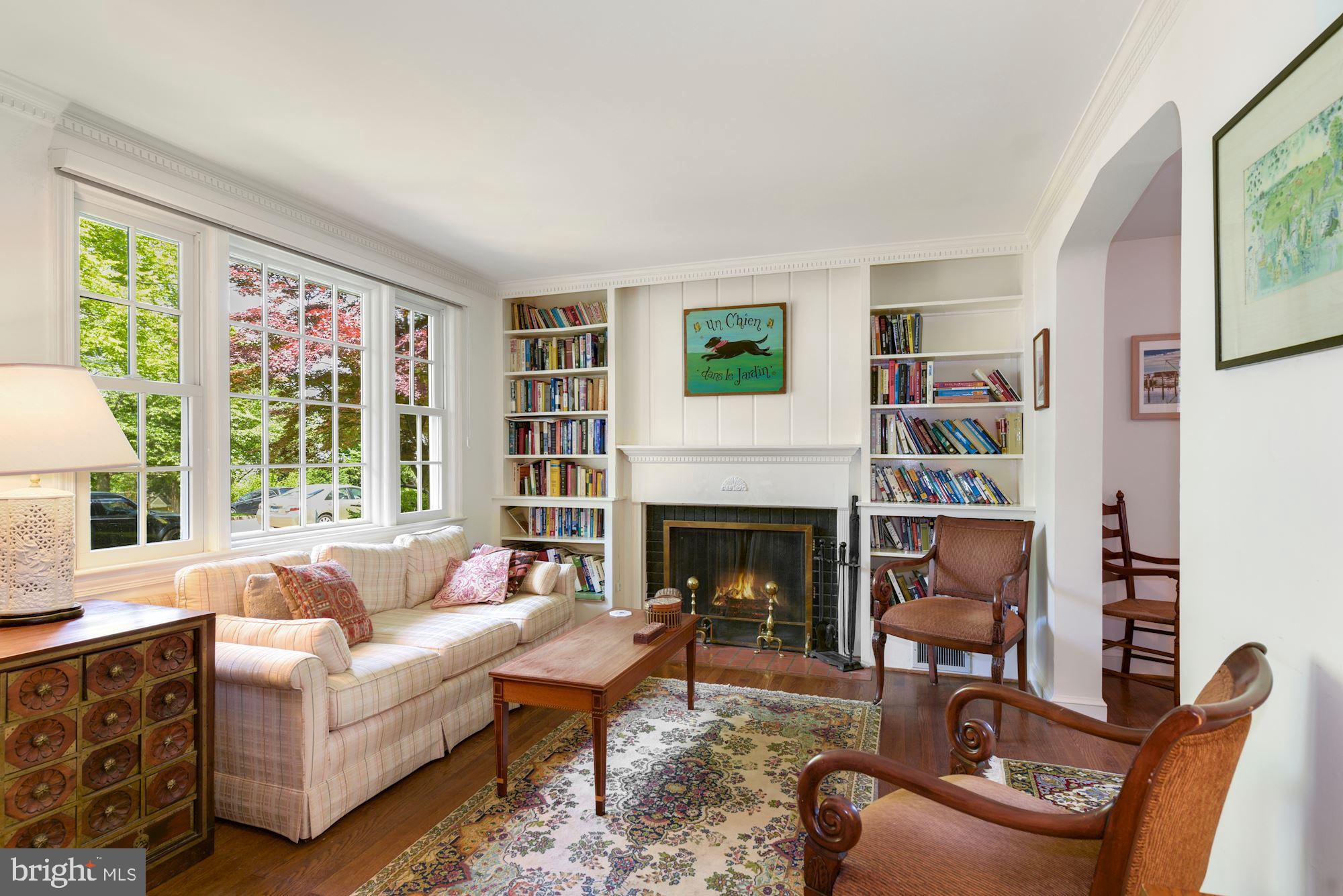 3120 Winnett Road Chevy Chase, MD 20815 - Photo 3 of 23 Living room has big window & fireplace