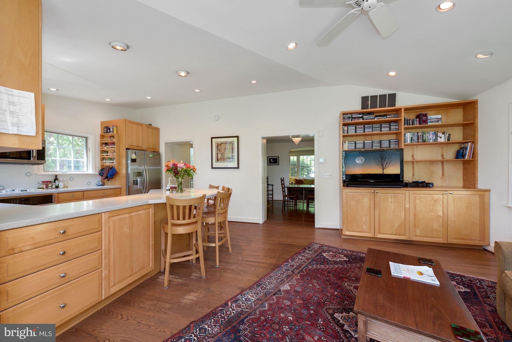 3120 Winnett Road Chevy Chase, MD 20815 - Photo 9 of 23 Family room has soaring ceilings & built-ins
