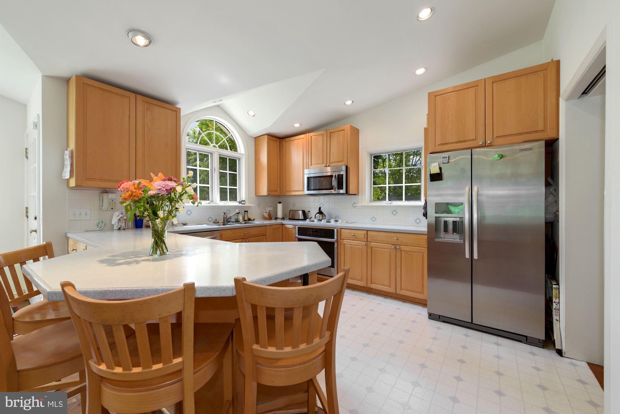 3120 Winnett Road Chevy Chase, MD 20815 - Photo 10 of 23 Breakfast bar between kitchen & family room