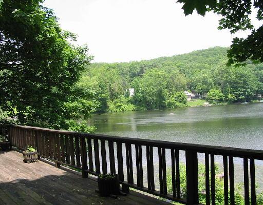 25 Lake Road Ridgefield, CT 06877 - Photo 1 of 1 a view of river and deck