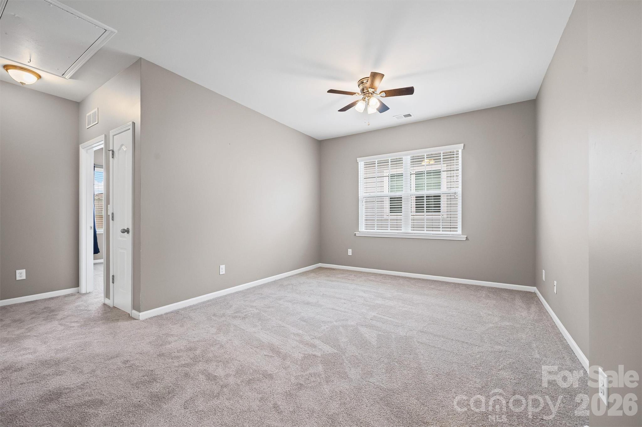 6179 Cloverdale Drive Fort Mill, SC 29708 - Photo 21 of 39 a view of an empty room with a window