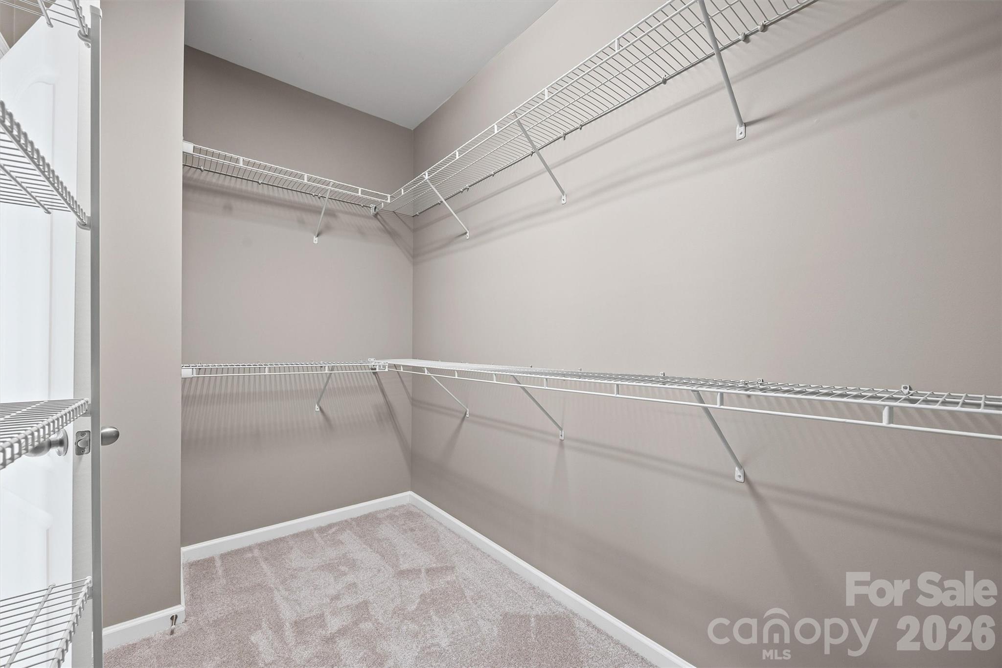 6179 Cloverdale Drive Fort Mill, SC 29708 - Photo 33 of 39 a view of a room with racks on the wall