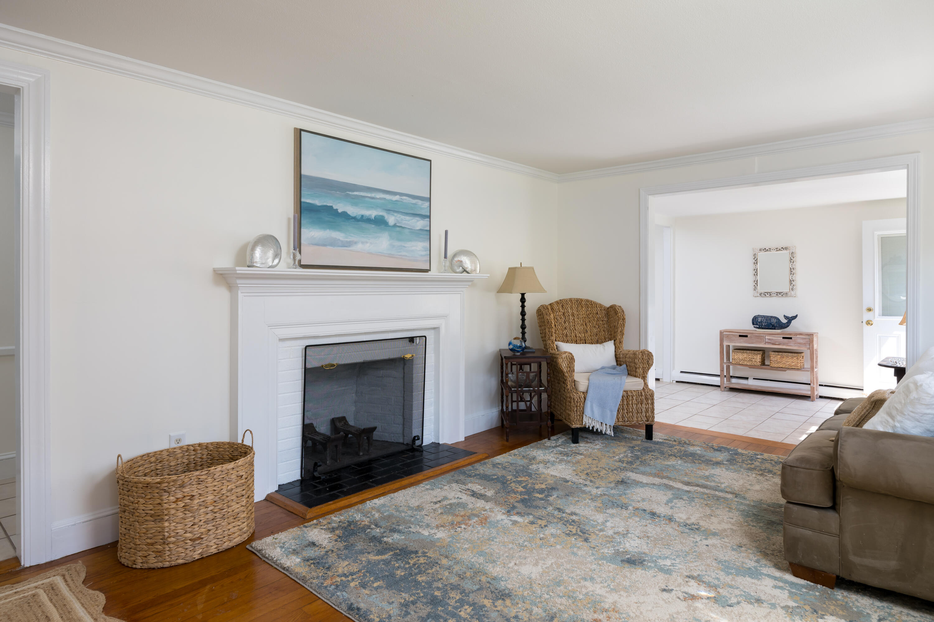 111 Lewis Road West Yarmouth, MA 02673 - Photo 9 of 43 a living room with furniture and a fireplace