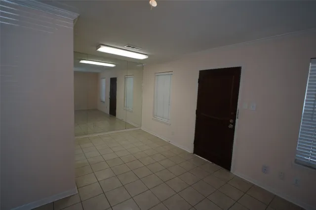 a view of a swimming pool with a yard