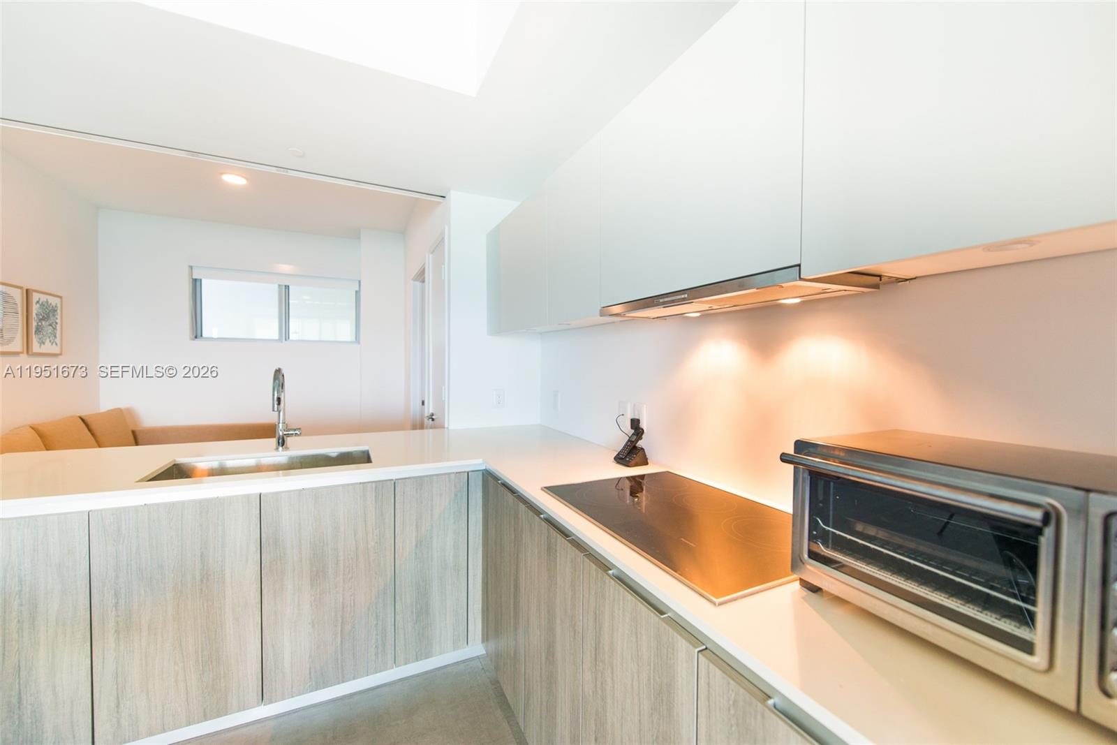 2900 Northeast 7th Avenue, Unit 1903 Miami, FL 33137 - Photo 11 of 43 a utility room with sink dryer and washer