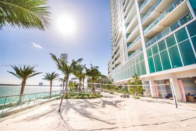 a view of outdoor space with palm trees