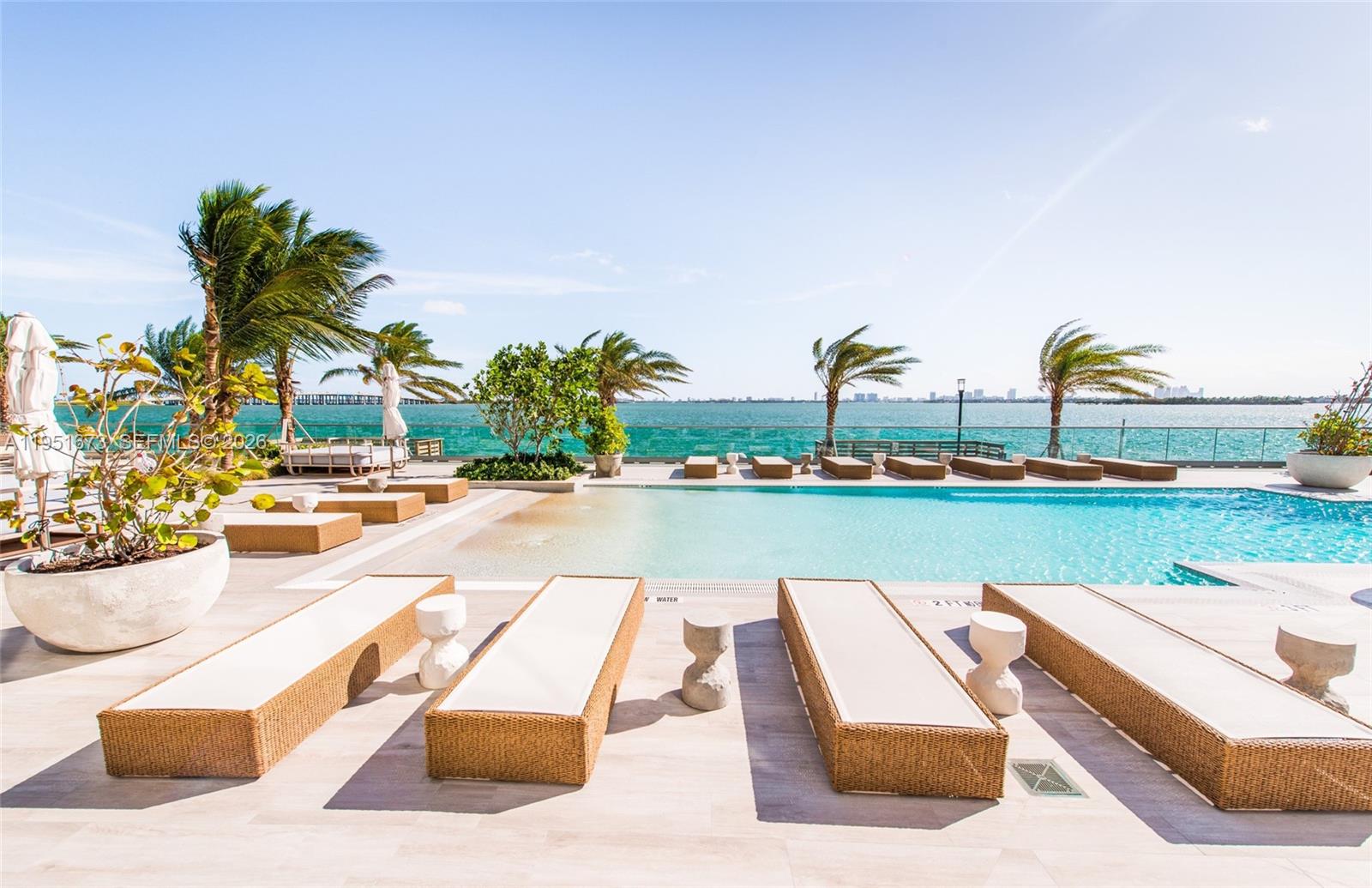 2900 Northeast 7th Avenue, Unit 1903 Miami, FL 33137 - Photo 20 of 43 a view of swimming pool with outdoor seating and plants