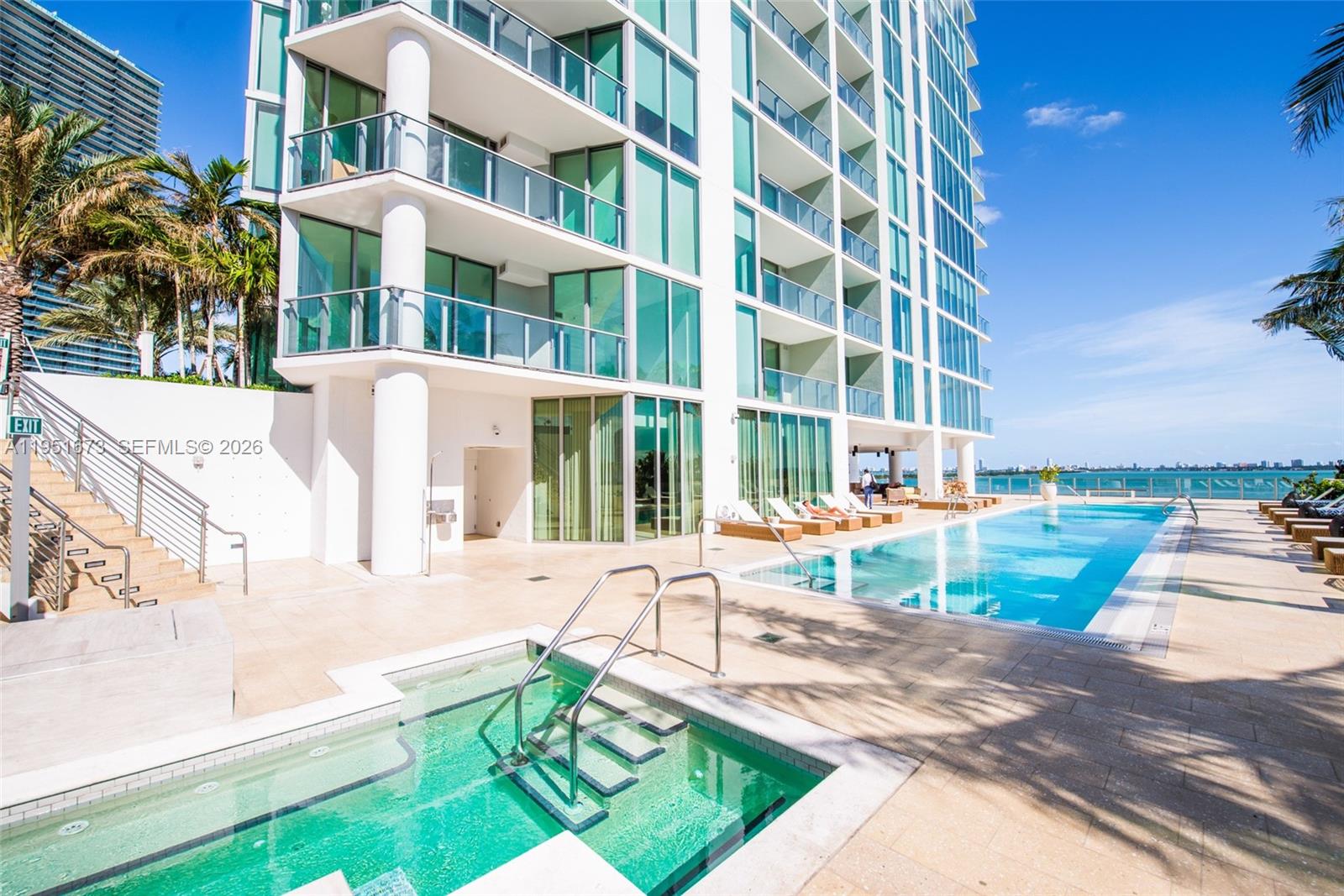 2900 Northeast 7th Avenue, Unit 1903 Miami, FL 33137 - Photo 32 of 43 a view of a building with a yard and sitting area