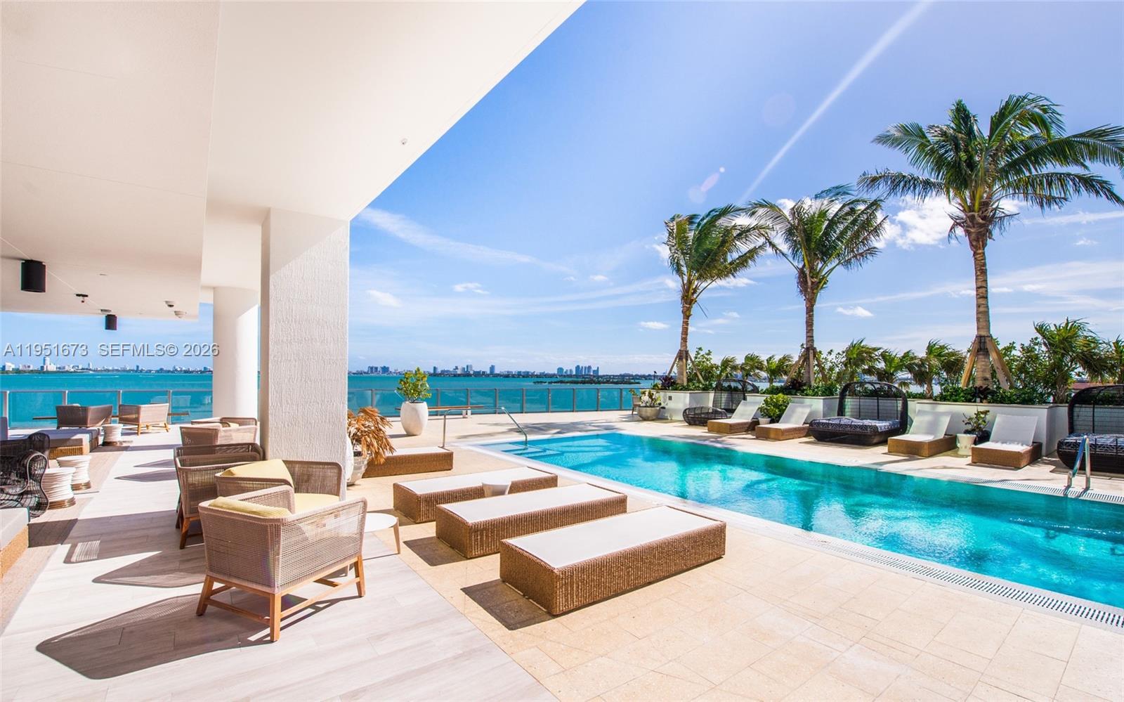 2900 Northeast 7th Avenue, Unit 1903 Miami, FL 33137 - Photo 34 of 43 a view of a terrace with furniture and garden