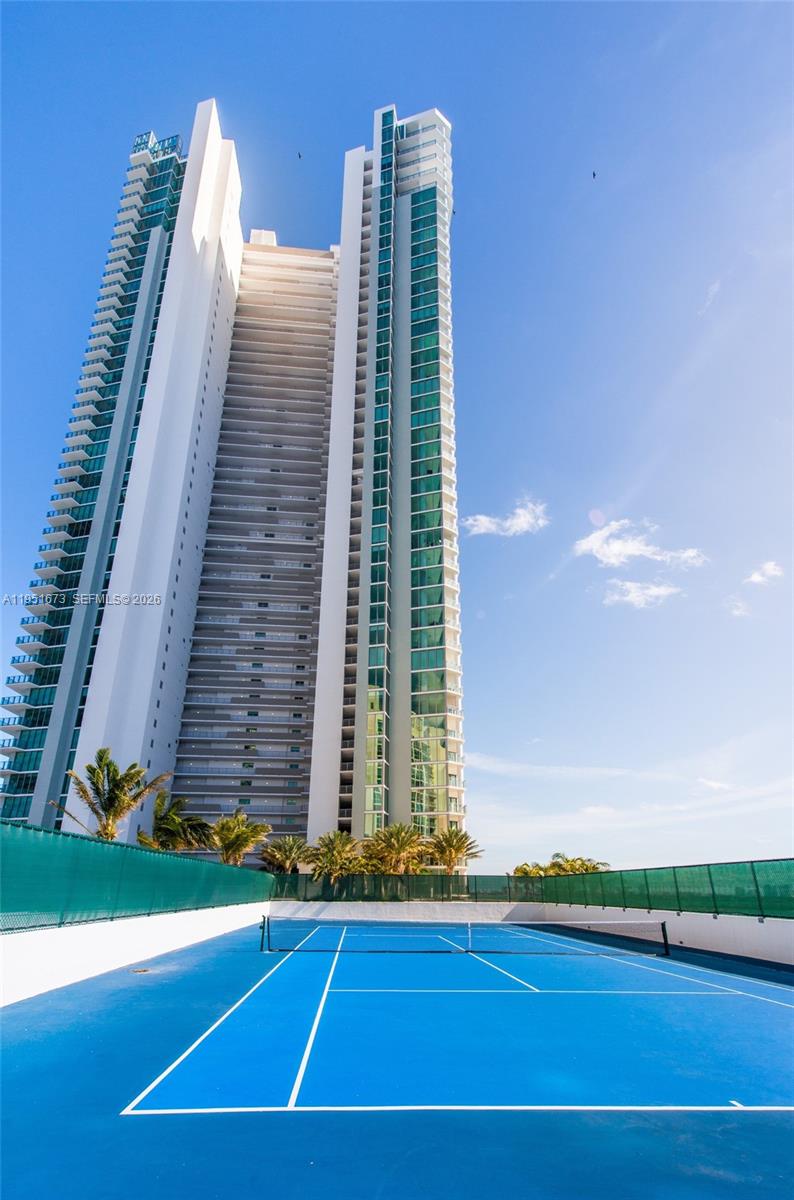 2900 Northeast 7th Avenue, Unit 1903 Miami, FL 33137 - Photo 35 of 43 a view of a tennis court with a large window