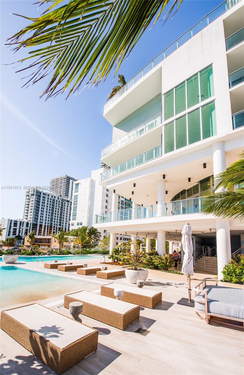 2900 Northeast 7th Avenue, Unit 1903 Miami, FL 33137 - Photo 41 of 43 a view of a swimming pool with outdoor seating