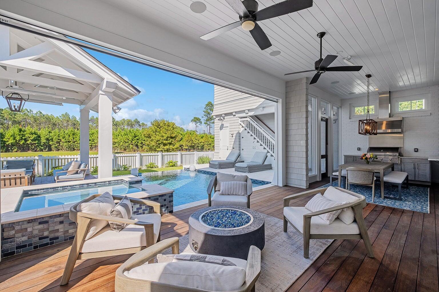 55 Seastone Ct Inlet Beach Inlet Beach, FL 32461 - Photo 12 of 68 a living room with furniture and a large window