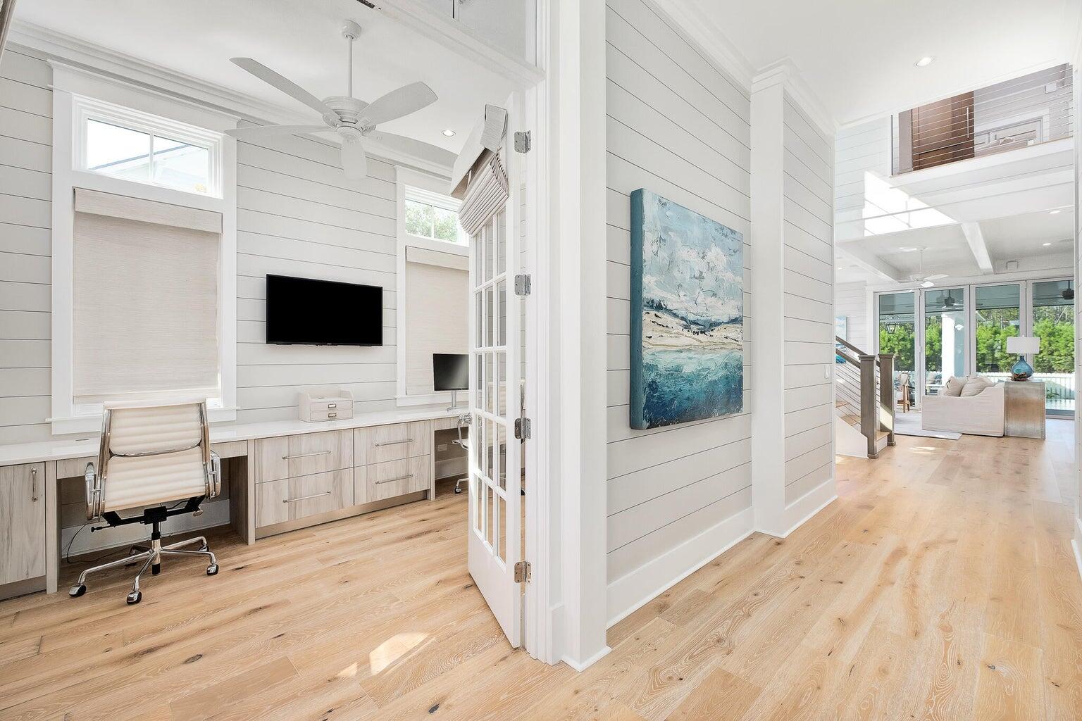 55 Seastone Ct Inlet Beach Inlet Beach, FL 32461 - Photo 17 of 68 a view of a livingroom with furniture and a flat screen tv