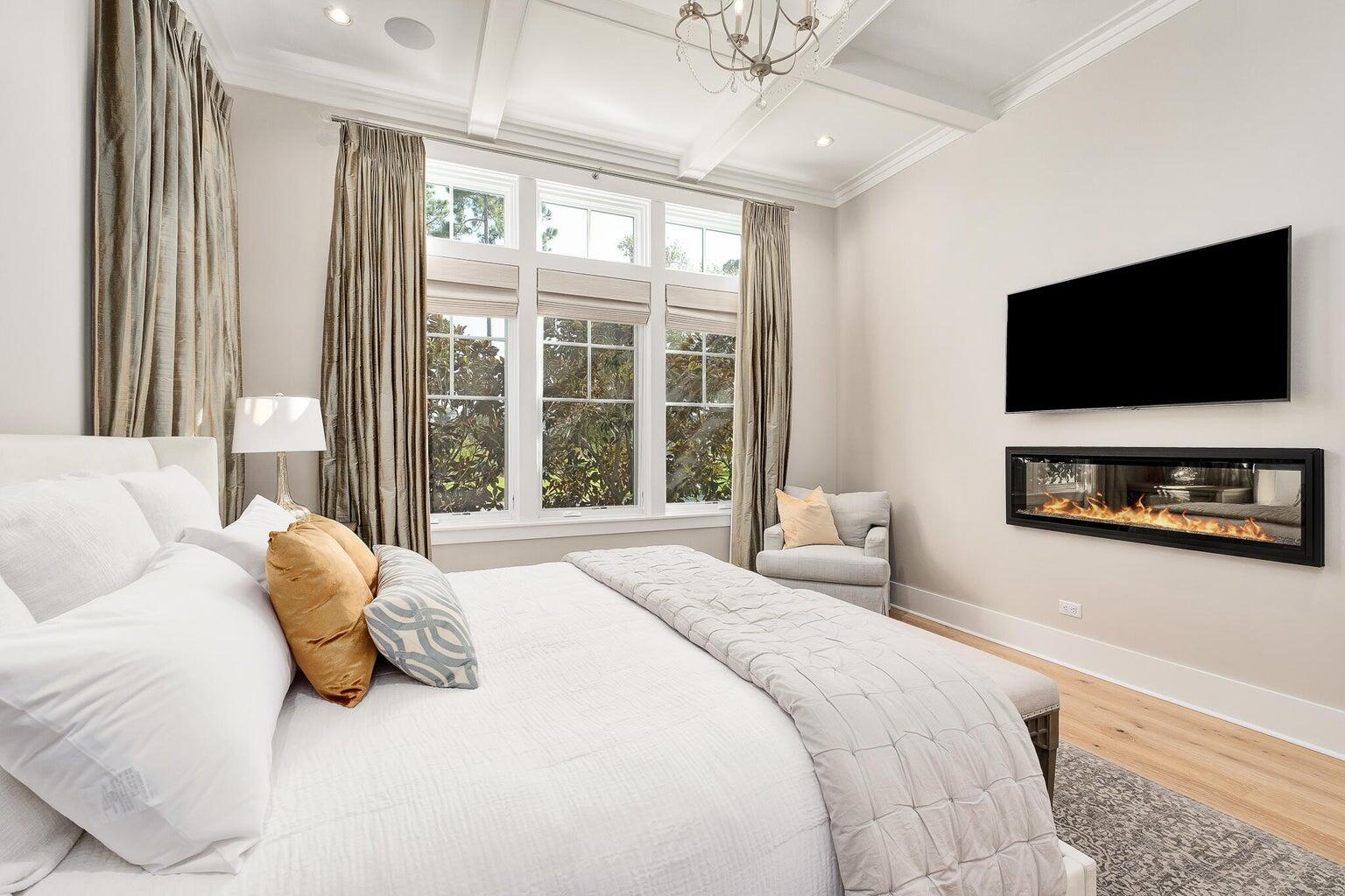 55 Seastone Ct Inlet Beach Inlet Beach, FL 32461 - Photo 24 of 68 a bedroom with a large bed and a flat screen tv