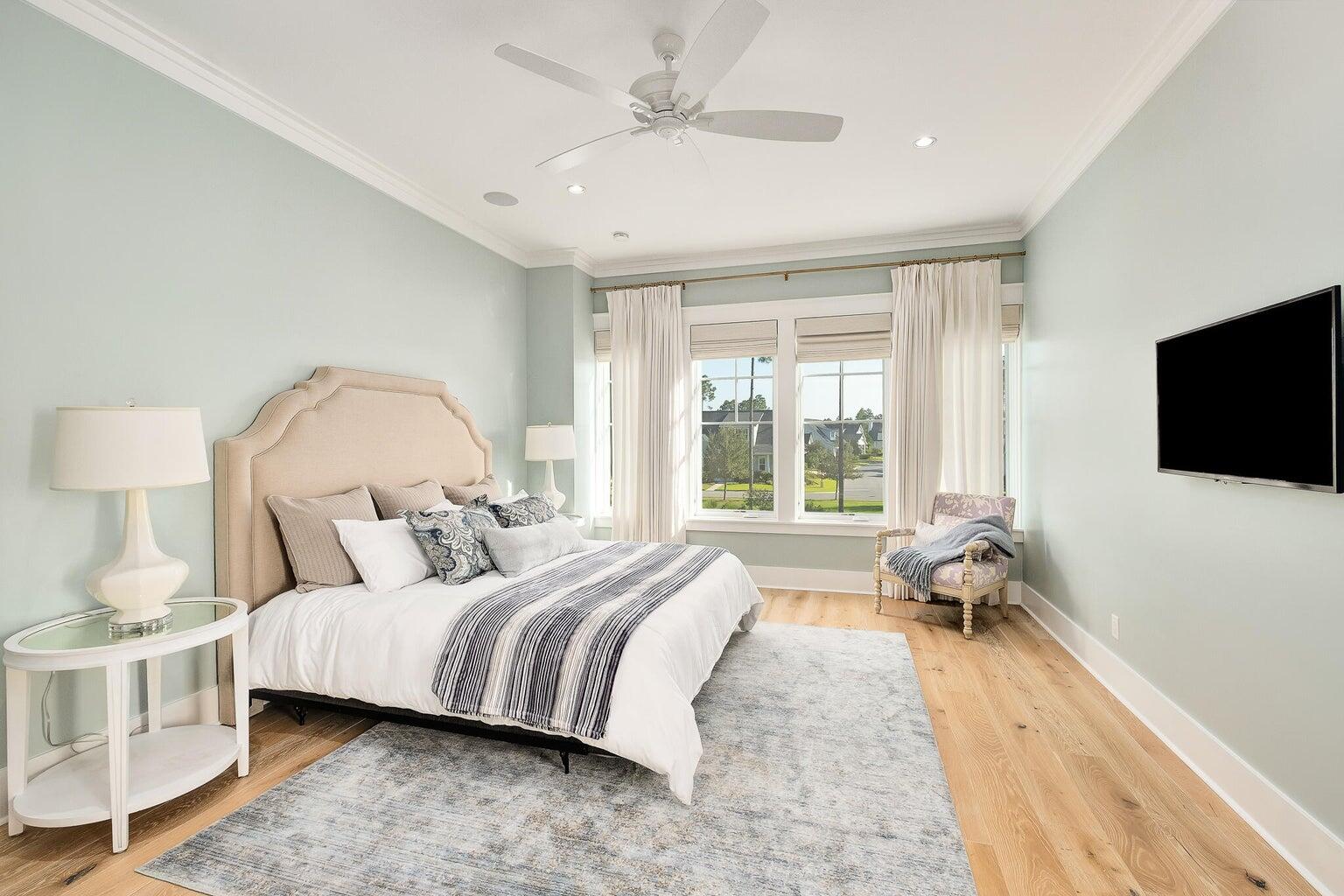 55 Seastone Ct Inlet Beach Inlet Beach, FL 32461 - Photo 32 of 68 a bedroom with bed and a flat tv screen on dresser