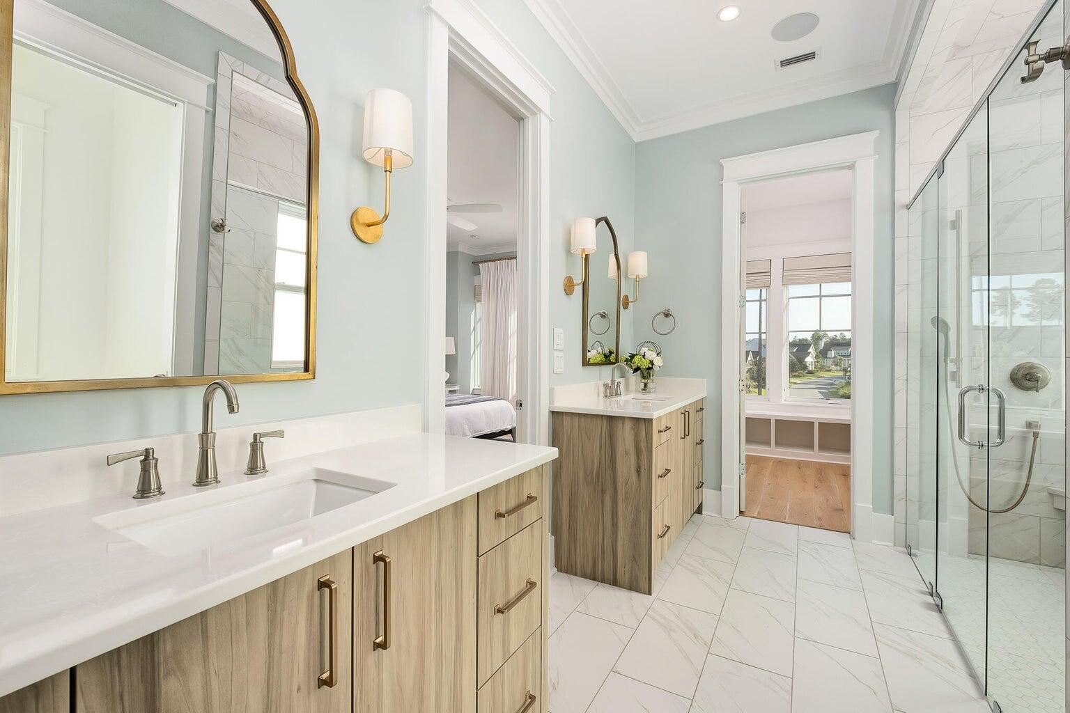 55 Seastone Ct Inlet Beach Inlet Beach, FL 32461 - Photo 33 of 68 a spacious bathroom with a double vanity sink a and a mirror
