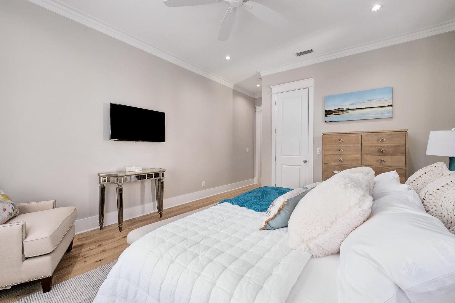 55 Seastone Ct Inlet Beach Inlet Beach, FL 32461 - Photo 38 of 68 a bedroom with a bed and a flat screen tv