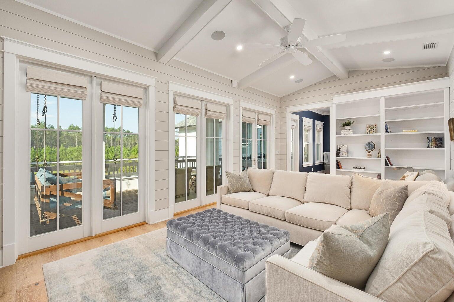 55 Seastone Ct Inlet Beach Inlet Beach, FL 32461 - Photo 47 of 68 a living room with furniture and a large window