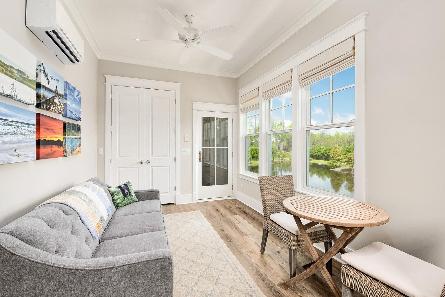 55 Seastone Ct Inlet Beach Inlet Beach, FL 32461 - Photo 51 of 68 a living room with furniture and a window