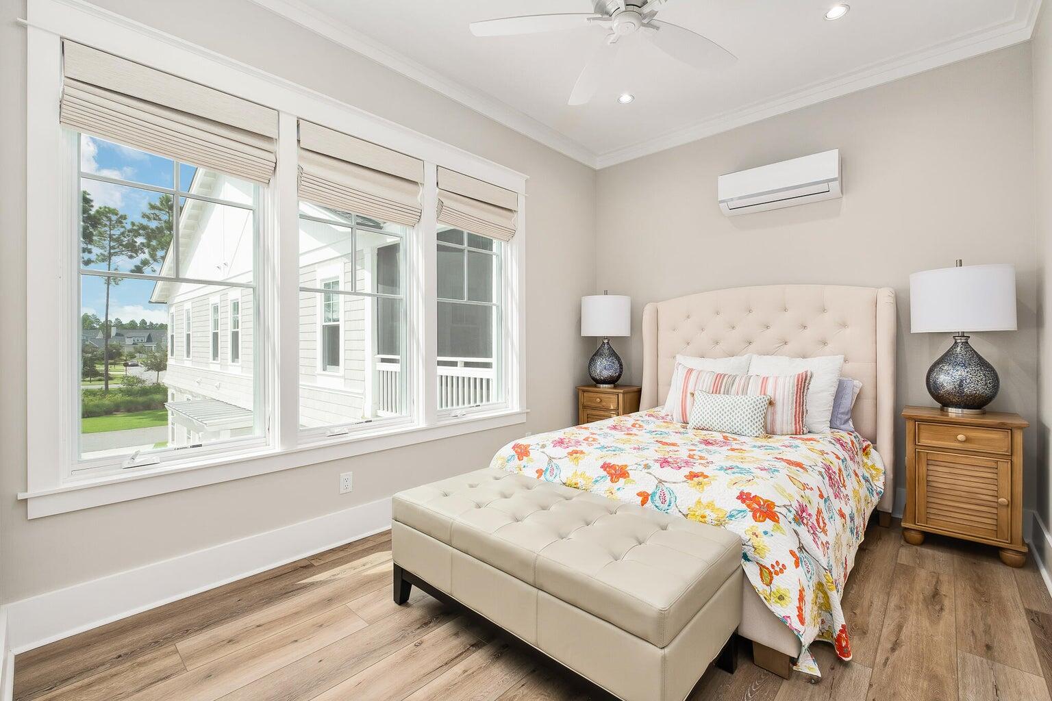 55 Seastone Ct Inlet Beach Inlet Beach, FL 32461 - Photo 53 of 68 a bedroom with a bed and a large window