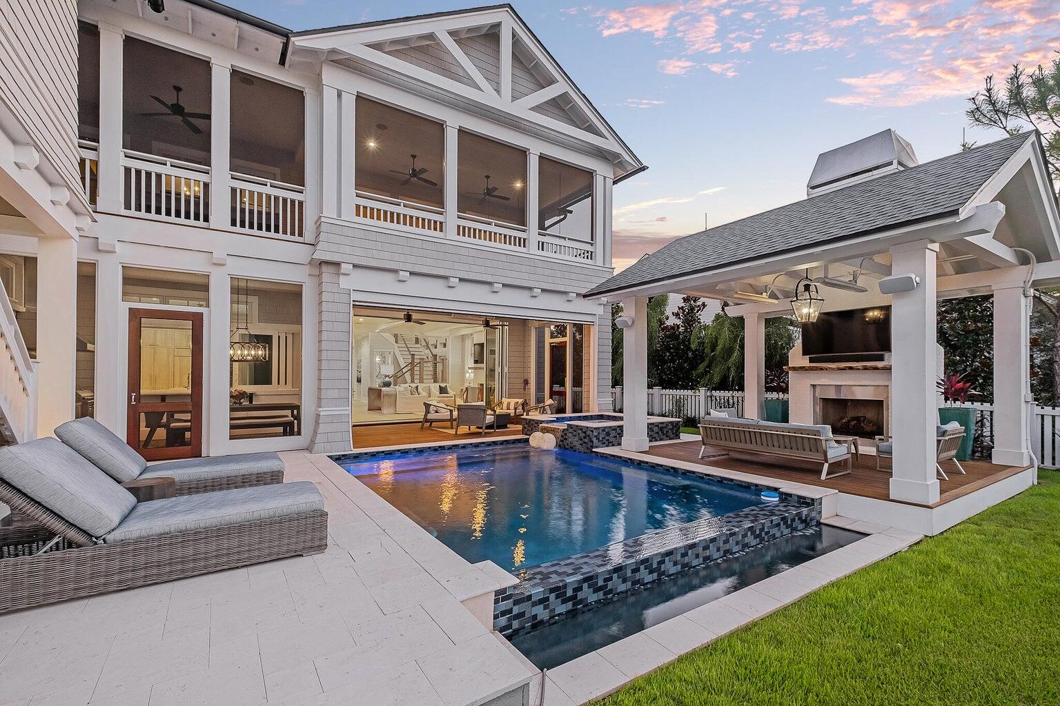 55 Seastone Ct Inlet Beach Inlet Beach, FL 32461 - Photo 57 of 68 a view of a house with swimming pool and porch