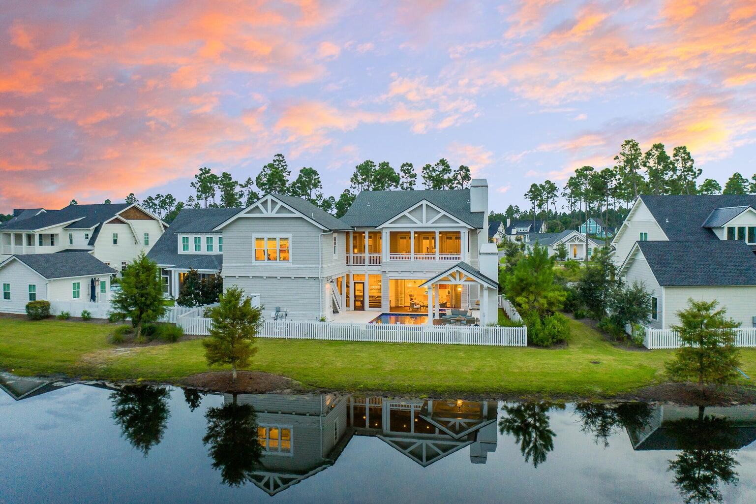 55 Seastone Ct Inlet Beach Inlet Beach, FL 32461 - Photo 59 of 68 a view of a swimming pool with a yard