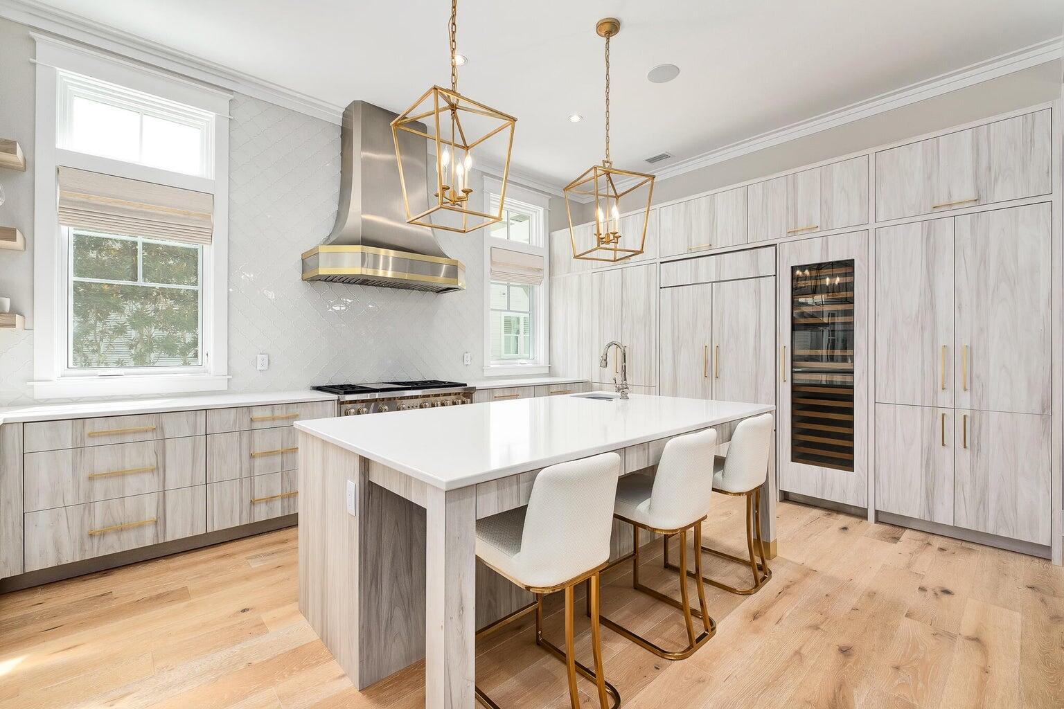 55 Seastone Ct Inlet Beach Inlet Beach, FL 32461 - Photo 9 of 68 a kitchen with a table and chairs in it