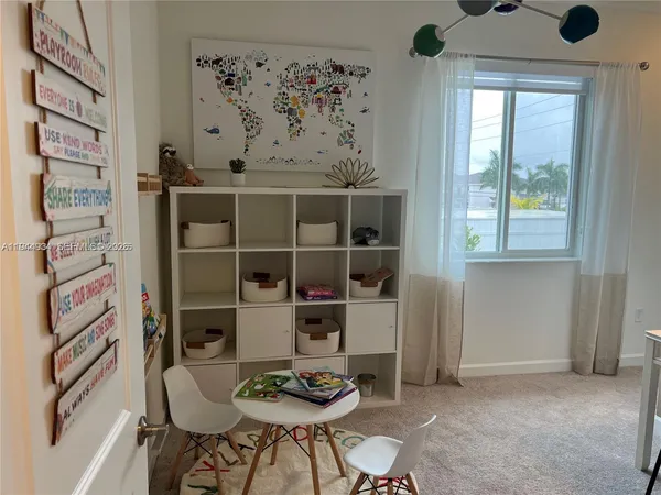 a black and white building with a sink