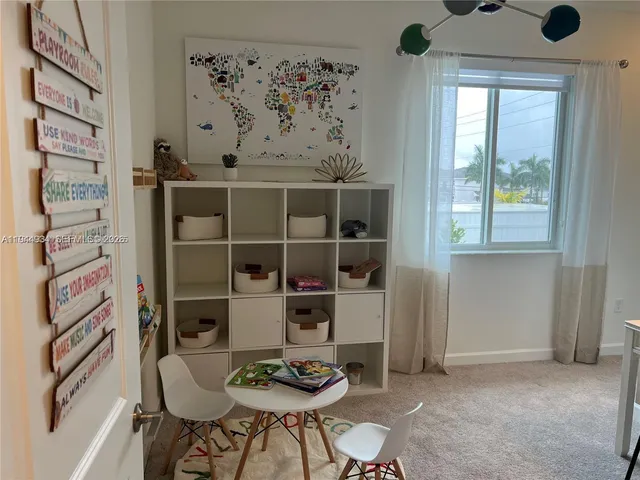 a black and white building with a sink
