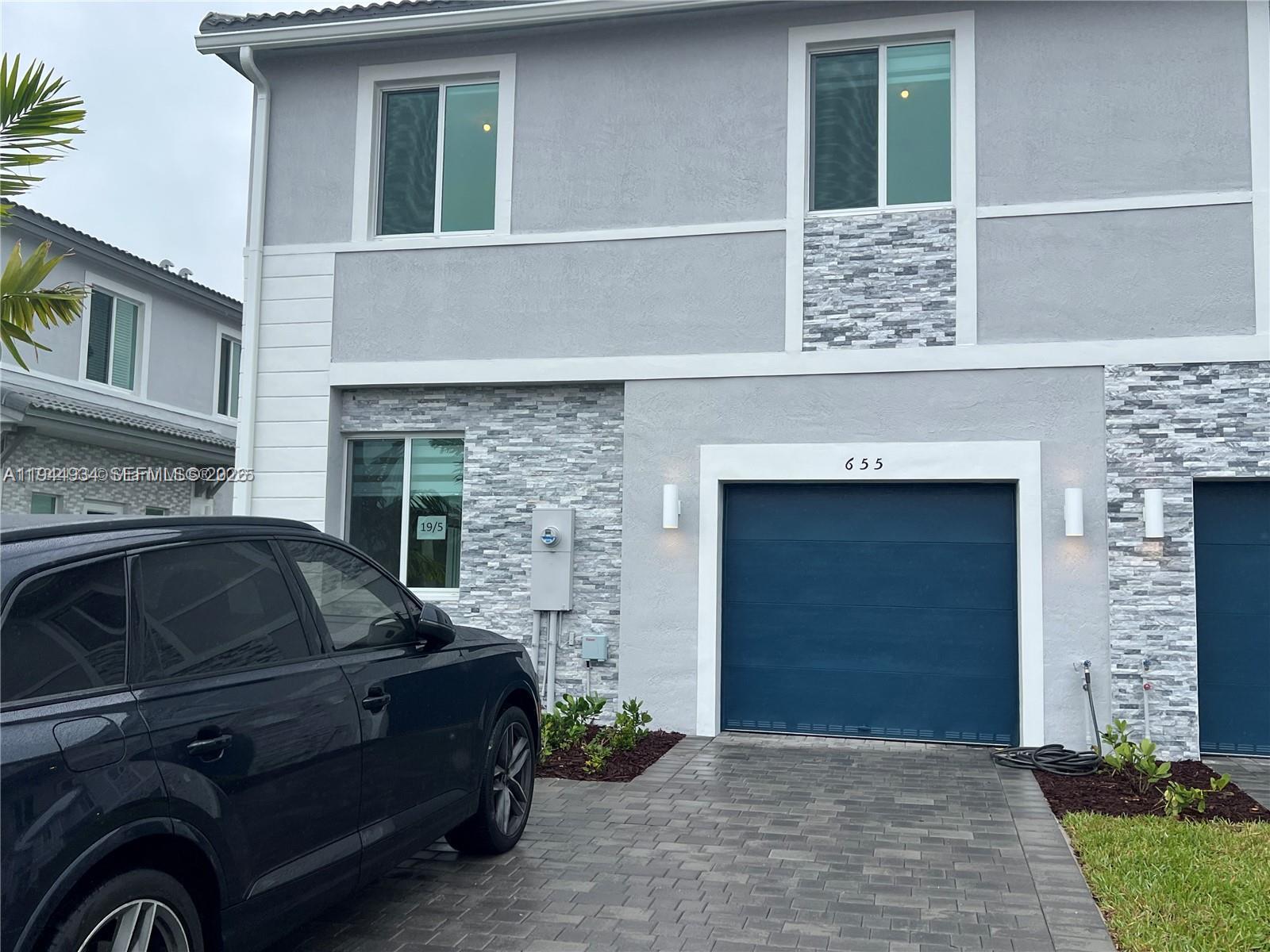 655 Southeast 13th Street Homestead, FL 33034 - Photo 27 of 38 a black and white building with a sink