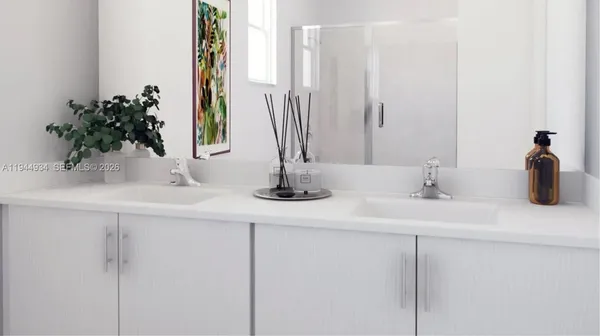 a kitchen with stainless steel appliances granite countertop a stove a microwave and a refrigerator