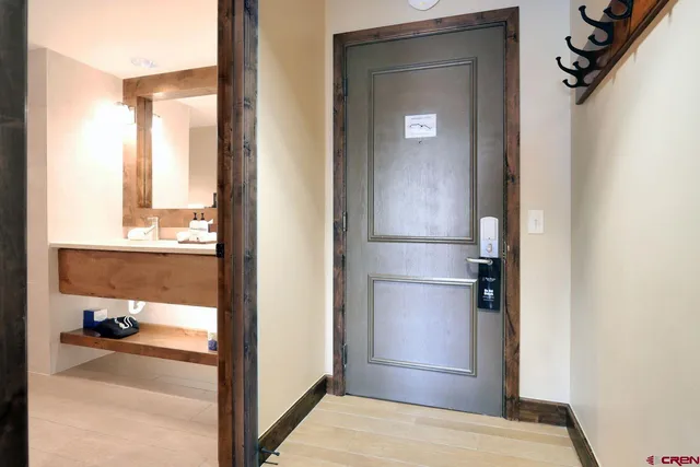 a view of a living room with a wooden floor