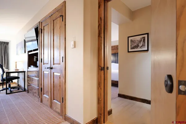 a view of a hallway with elevator