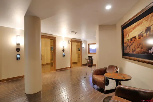 a room with furniture and wooden floor