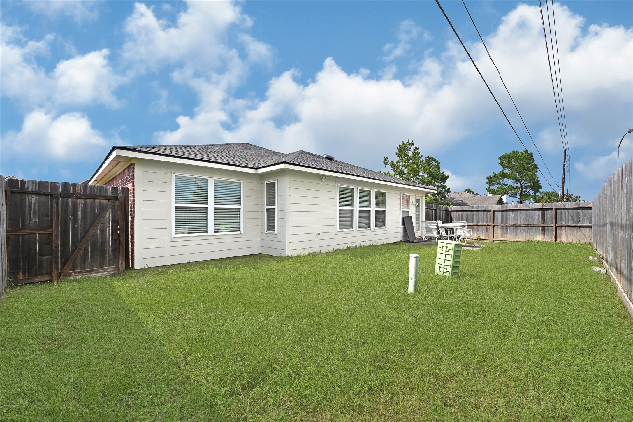 3114 Rendezvous Court Spring, TX 77373 - Photo 23 of 24 a view of a house with a backyard