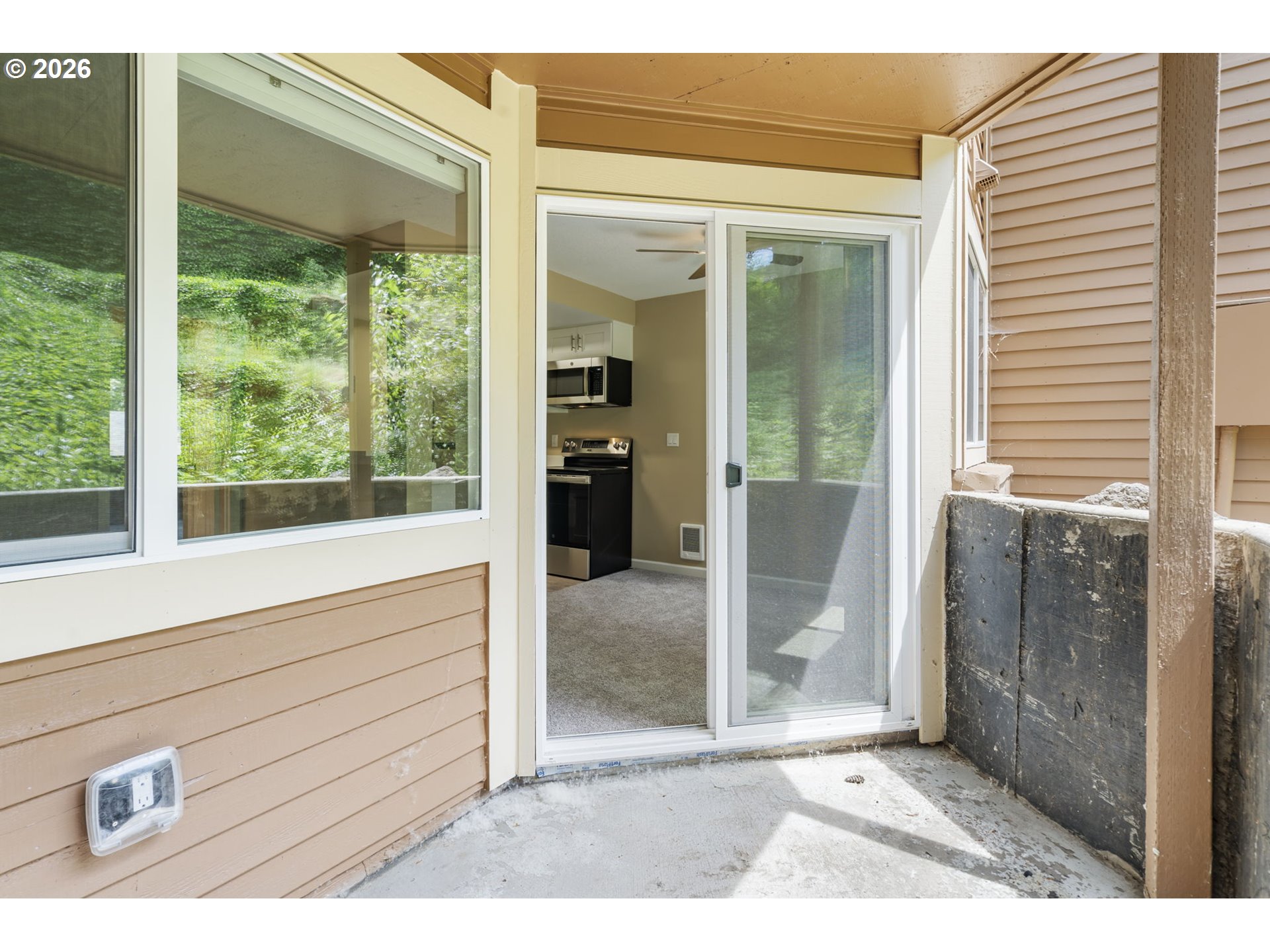 9967 Southeast Talbert Street Clackamas, OR 97015 - Photo 29 of 33 a view of a door front of a house