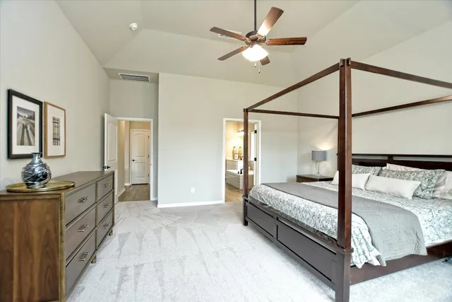 a spacious bathroom with a double vanity sink a mirror and a shower