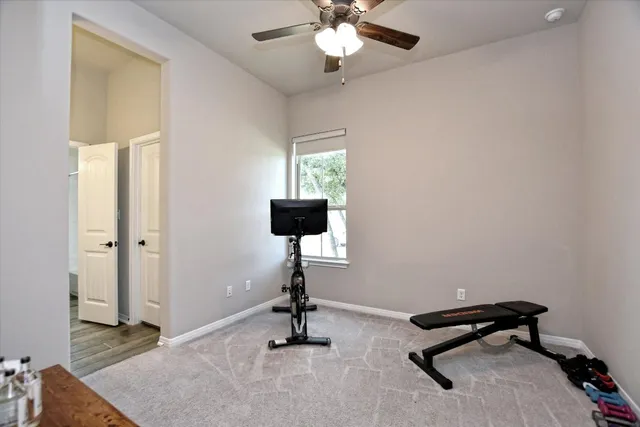 a bathroom with a double vanity sink mirror and toilet